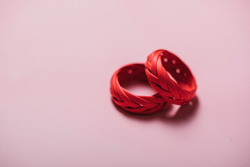 Red wedding rings. Love concept. Photo. Sensual. 