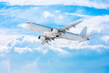 Fototapeta na wymiar White passenger airplane fly in the picturesque sky