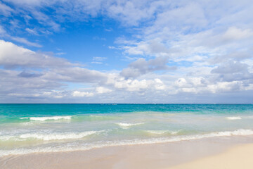 Fototapeta na wymiar Coastal Caribbean landscape with empty sandy coast