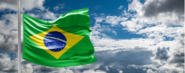 The flag of Brazil flutters in the wind in the center of the flag with the words order and progress Brazil election: ex-president Luiz Inácio Lula da Silva to face Jair Bolsonaro in runoff - obrazy, fototapety, plakaty