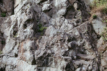 Stone rocks on the mountain as background.