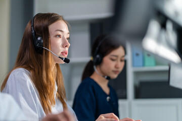 Beautiful Caucasian businesswoman call center work in office corporate. 