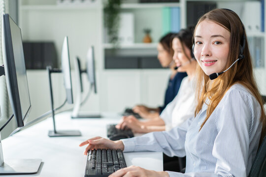 Portrait of Caucasian young business woman call center work in office.