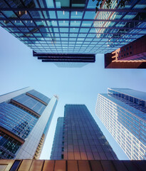 Fototapeta na wymiar Skyscrapers. looking up to modern high rise office buildings