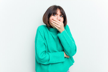 Young caucasian woman isolated on white background scared and afraid.