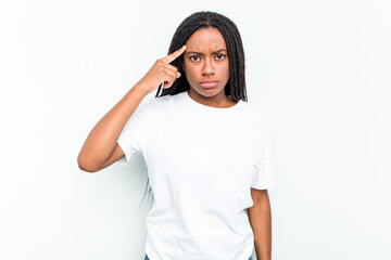 Young African American woman isolated on white background pointing temple with finger, thinking, focused on a task.