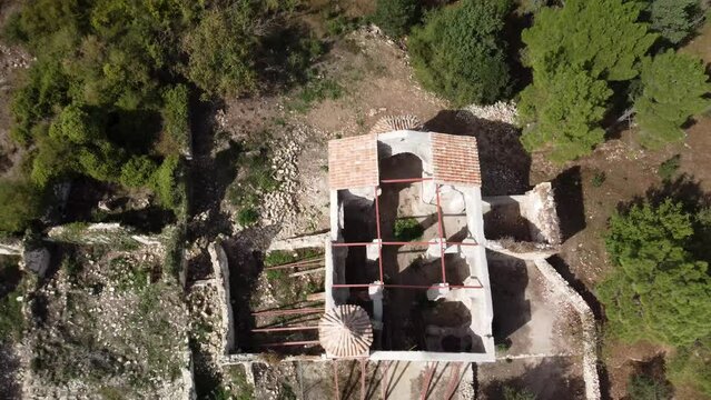 Video of the rocky cliffs of the abandoned village La Mussara, Tarragona, with views of mountains, forests and sky with clouds. "Spain emptied". Depopulation.