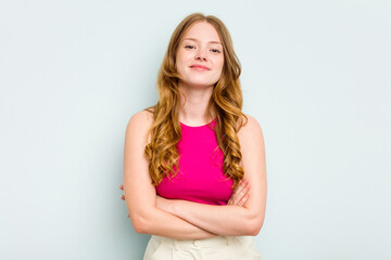 Portrait of pretty young caucasian woman isolated on blue background
