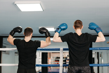 Boxers train in the ring and in the gym