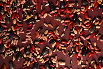 background with scattered colorful organic beans