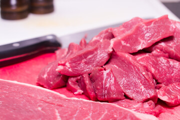 Cut of grass-fed beef on cutting board