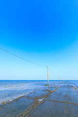Fototapeta premium 初秋の太良海中道路 佐賀県東彼杵町 Tara undersea road in early autumn. Saga prefecture Tara town.