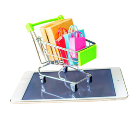 Product package box and shopping bag in cart with tablet which web store shop on screen for online shopping and delivery concept. © Marcela Ruty Romero