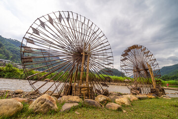 Fototapeta premium view of Water mill in Mu Cang Chai, Yen Bai province, Vietnam in a summer day