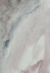 White-gray watercolor background. Transparent lines and spots on a white paper background. Paint leaks and ombre effects. Hand-painted abstract image.