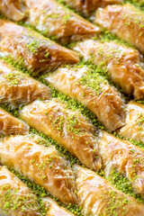 Baklava with pistachio in a tray. Aegean cuisine delicacies. local name sobiyet baklava. Close up