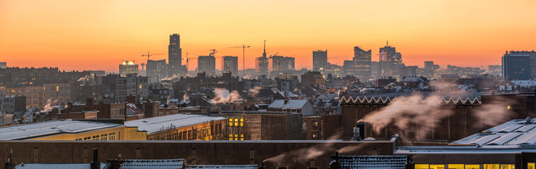 Jette, Brussels Capital Region -Belgium - Panoramic view of the Brussels skyline around the business district during the golden hour in the early morning, before sunrise
