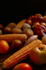 vegetables on a table. still life. healthy concept. tomato, bell pepper, garlic, potato, apple