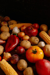vegetables on a table. still life. healthy concept. tomato, bell pepper, garlic, potato, apple