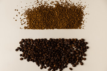 A light background divided in two by coffee beans and instant coffee. Place for text