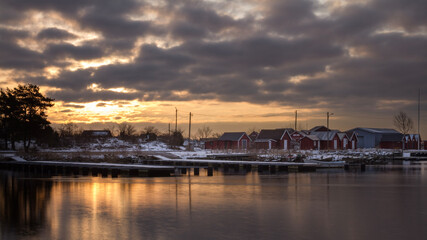 Obraz na płótnie Canvas Garpahamnen marina on Hasslö island in Karlskrona minicipality, Sweden, at sunrise