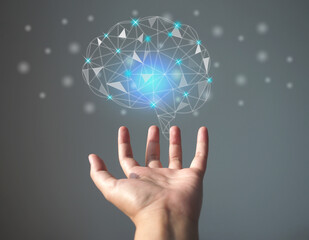 Artificial intelligence, machine learning and futuristic innovation, Human hand with ai brain...