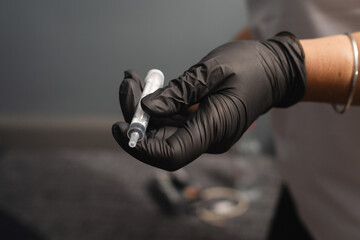 A close up of hands and blood draw process