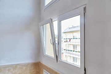 Window tilted open in a room - 535237927