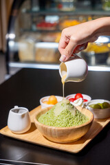 Set Bingsu green tea with fruit,whipped cream and sweetened condensed milk and chocolate