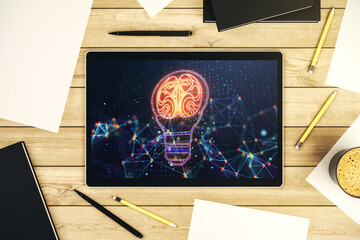 Creative light bulb with human brain hologram on modern digital tablet display, artificial Intelligence and neural networks concept. Top view. 3D Rendering