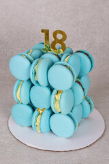 unusual almond blue macaron cake. creative cake cube for 18 birthday