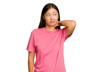 Fototapeta premium Young Asian woman isolated on green chroma background touching back of head, thinking and making a choice.