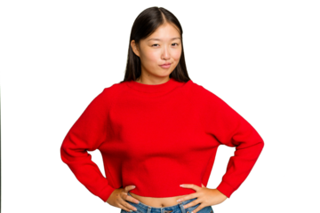 Young Asian woman isolated on green chroma background frowning face in displeasure, keeps arms folded.