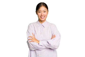 Young Asian woman isolated on green chroma background who feels confident, crossing arms with...