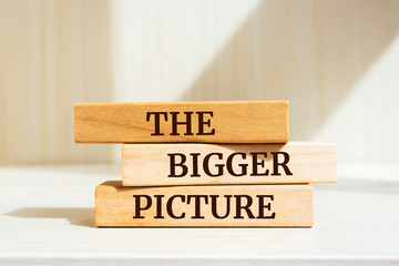 Wooden blocks with words 'THE BIGGER PICTURE'.