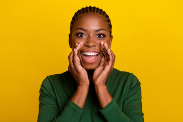 Photo of sweet funky woman wear green shirt telling you announcement isolated yellow color...