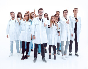 large group of diverse doctors giving a thumbs up