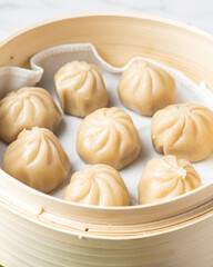 Japanese dumpling in a bamboo steamer