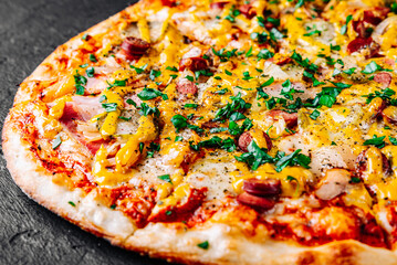 Pizza with Mozzarella cheese, ham, tomato sauce, pepper, pepperoni, sausage and mustard sauce.