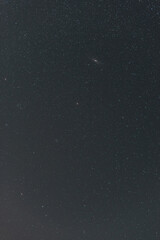 Many stars on black sky at night. A real dark night sky with plenty of stars. Night sky background...