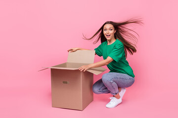 Full size photo of pretty cheerful girl straight hairdo green t-shirt jeans open box deliver on...