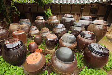 Terracotta kimchi jars outside a traditional Korean house called Hanok, South Korea