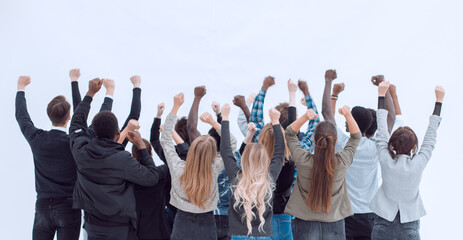 group of young people arms up