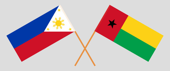 Crossed flags of the Philippines and Guinea-Bissau. Official colors. Correct proportion