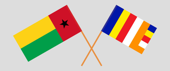 Crossed flags of Guinea-Bissau and Buddhism. Official colors. Correct proportion - obrazy, fototapety, plakaty