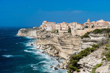 Fototapeta na wymiar Old town of Bonifacio, built on cliff rocks. Corsica, France. 