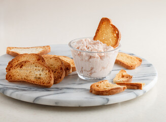 Shrimp dip and bread chips (toasted bread). A delicious seafood appetizer with mayonnaise. Mediterranean cuisine. Selective focus, copy space