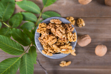Мarble bowl filled with shelled walnuts