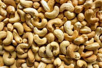 Cashew nut close-up. A full-fledged source of vegetable protein for vegetarianism and raw food. Concept is healthy eating.