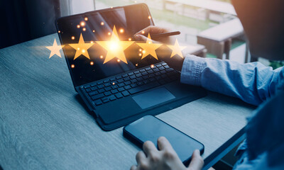 close up Woman hand using smart phone and give five star symbol to increase rating of product and service concept, Customer service experience and business satisfaction survey.